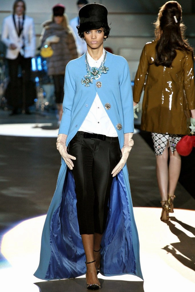 Dsquared2 - As Seen on the 2012 Runway Collection, Look 26 - Black Patent Heels with Rhinestones - Identify How Wearing Heels And Foot Binding Are Similar