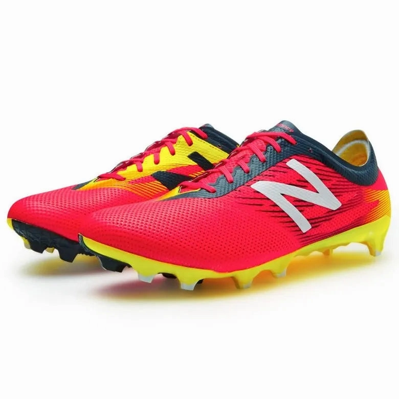 Artificial Grass Vs Turf Soccer Cleats New Balance Furon II Pro FG - Pink-Yellow-Black